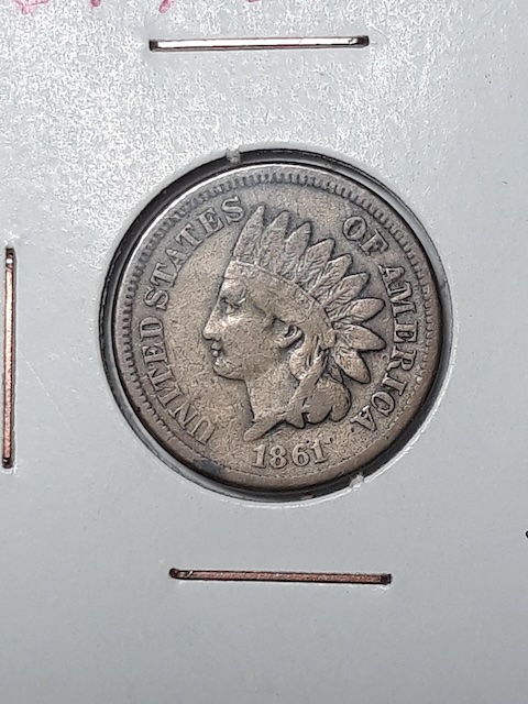 Snow-3 ODD-001 on 1861 Indian Head penny — obverse showing off-center clashed die marks near center arrowhead position